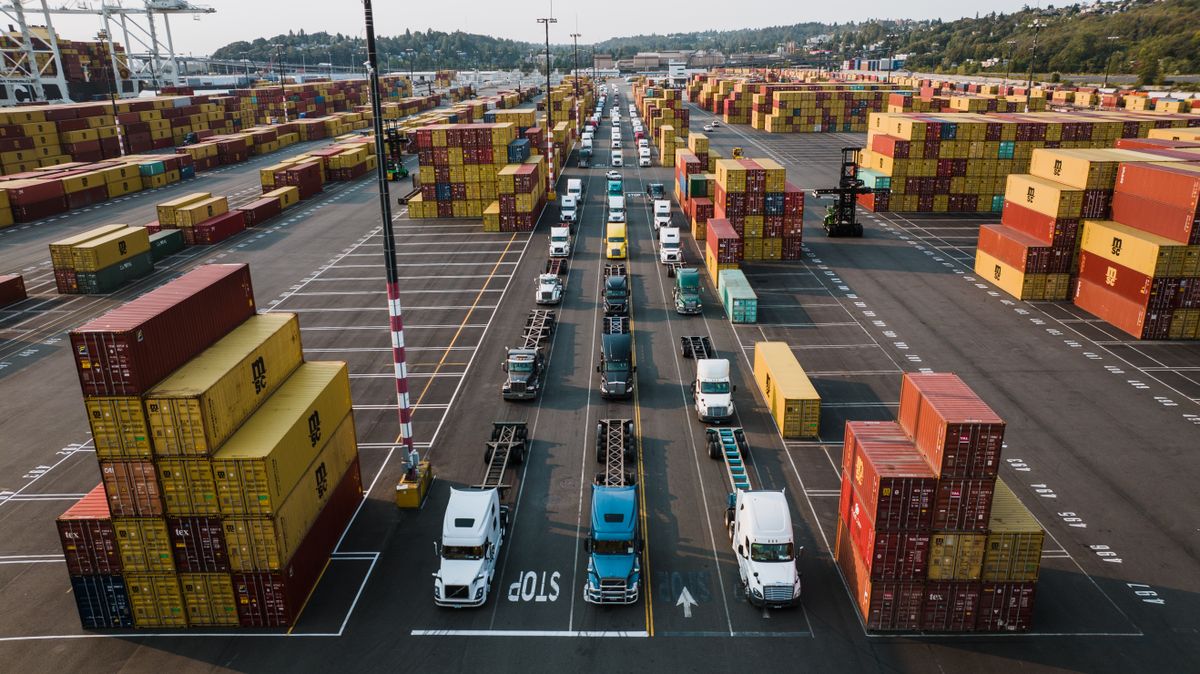 Trucks and cargo containers at a port